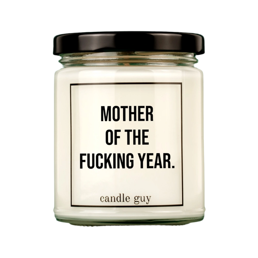 Candle Guy scented candle in a glass