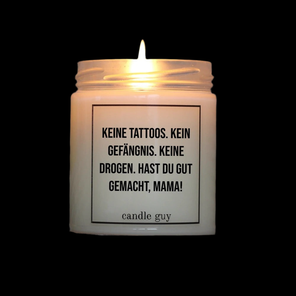 Candle Guy scented candle in a glass